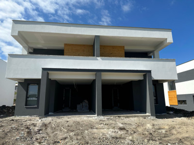 Casa modernă cu garaj si utilitati 